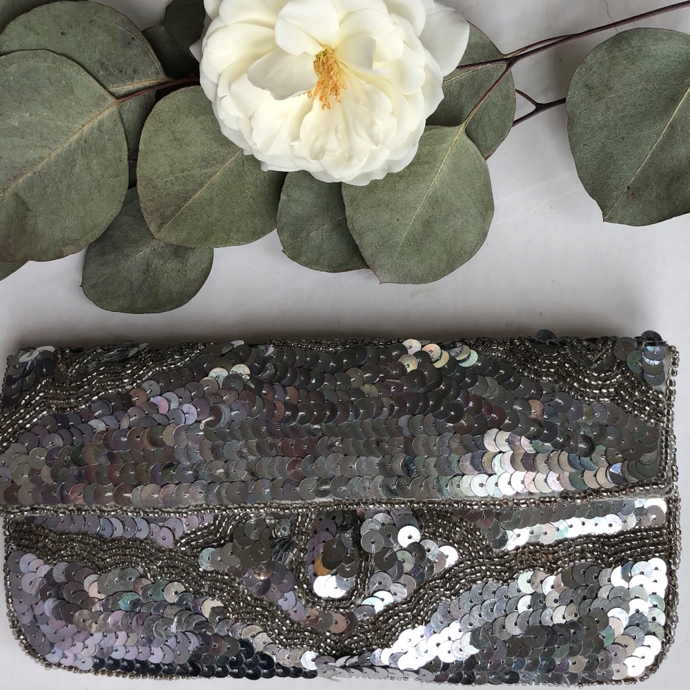 Silver sequined clutch